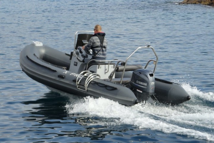 a small boat in a body of water